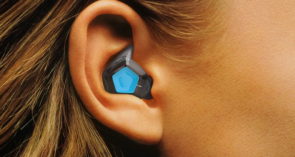 A KANOA earphone in the ear